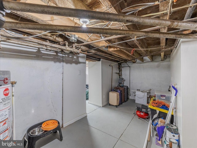 unfinished basement with water heater