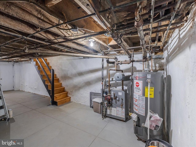 unfinished below grade area with water heater, stairway, and a heating unit