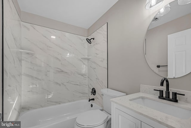 bathroom featuring vanity, toilet, and bathtub / shower combination