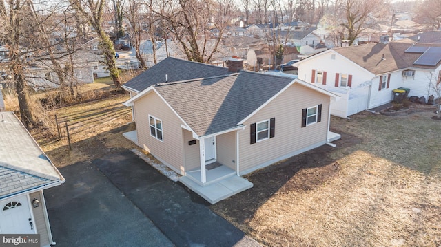 drone / aerial view featuring a residential view