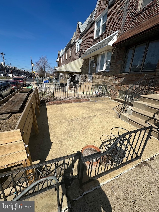 view of patio with fence