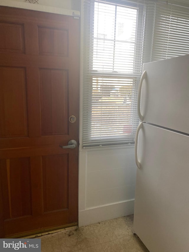 entryway featuring light floors