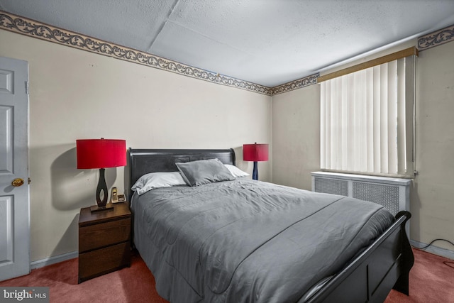 carpeted bedroom with radiator, baseboards, and a textured ceiling