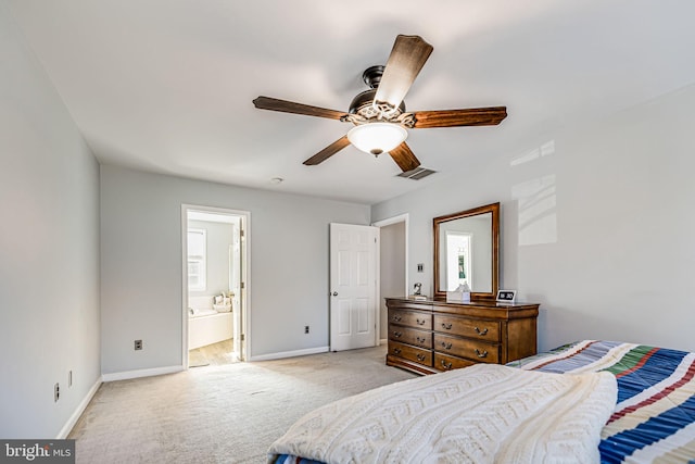 bedroom featuring visible vents, light colored carpet, baseboards, and ceiling fan