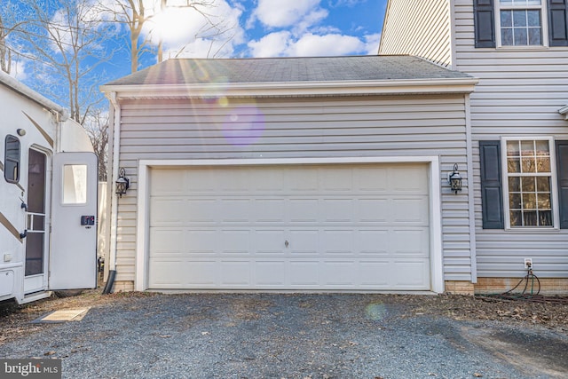 garage with driveway