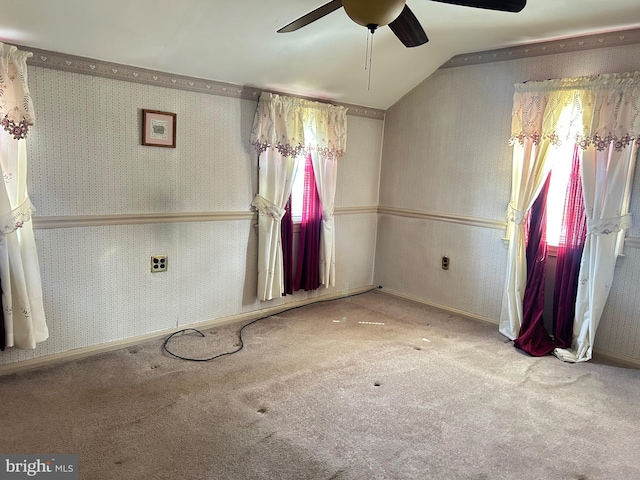 607 Braxton Rd, Ridley Park, PA 19078 - empty room with a ceiling fan, carpet flooring, vaulted ceiling, and wallpapered walls