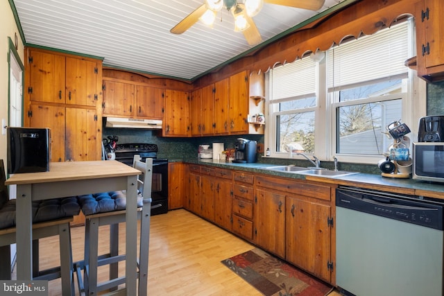 kitchen featuring a sink, black range with electric stovetop, under cabinet range hood, dishwasher, and brown cabinets