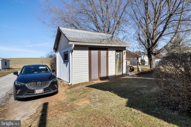 view of outbuilding featuring an outdoor structure