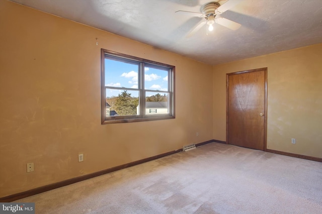 unfurnished bedroom featuring carpet flooring, visible vents, baseboards, and a closet