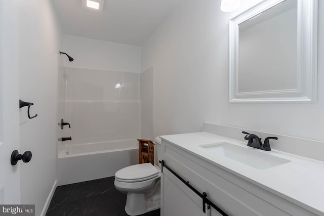 bathroom featuring marble finish floor, toilet, vanity, and bathtub / shower combination