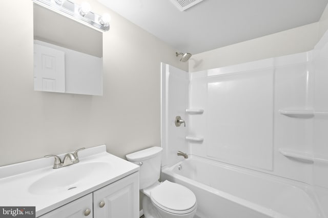 bathroom with visible vents, tub / shower combination, toilet, and vanity