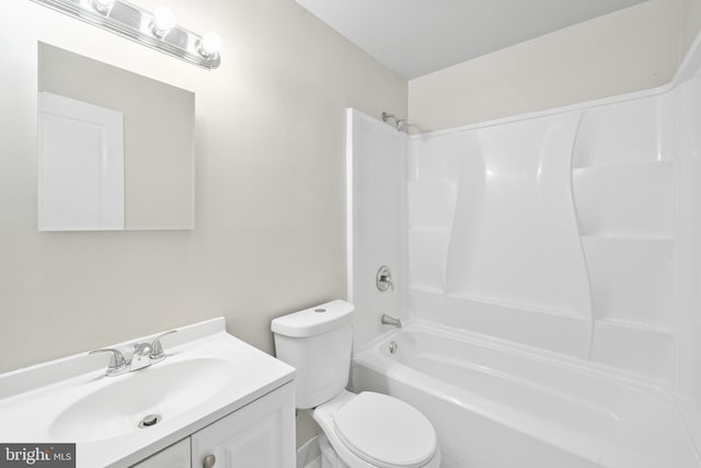 bathroom with vanity, toilet, and shower / bath combination