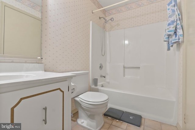 full bathroom with toilet, tile patterned flooring, wallpapered walls, bathing tub / shower combination, and vanity