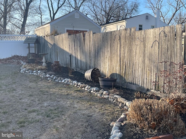 view of yard featuring fence