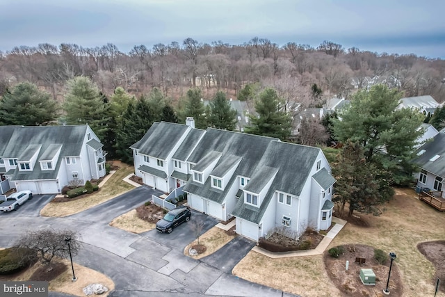 bird's eye view featuring a forest view