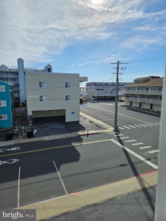 view of road featuring curbs and sidewalks