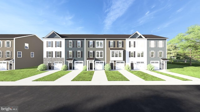 view of front facade featuring a garage and a front lawn