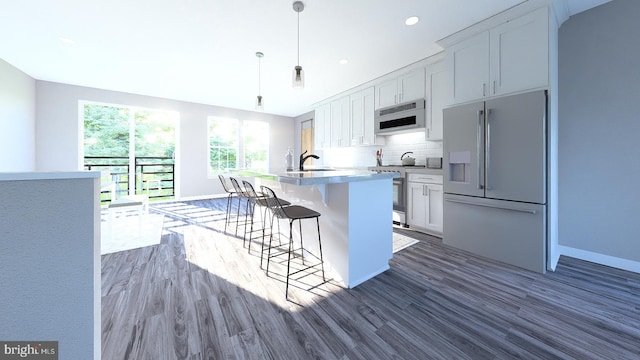 kitchen featuring stainless steel electric range oven, dark wood-type flooring, decorative backsplash, and high end refrigerator