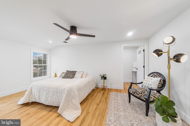 bedroom with recessed lighting, ceiling fan, baseboards, and wood finished floors