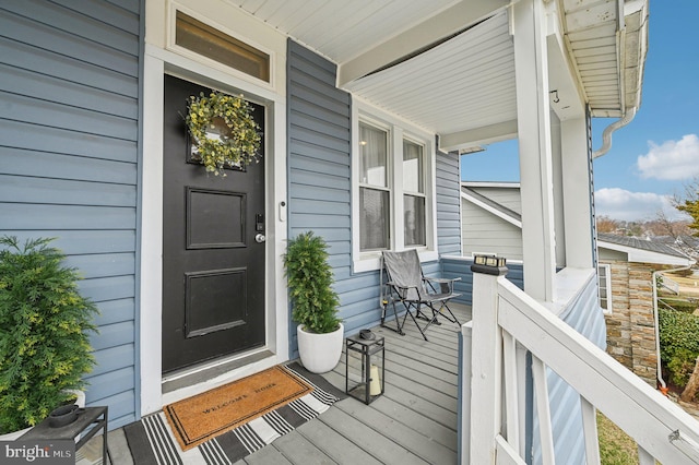 doorway to property with a porch