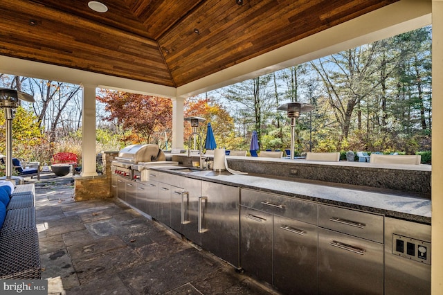 view of patio / terrace with grilling area and mail area