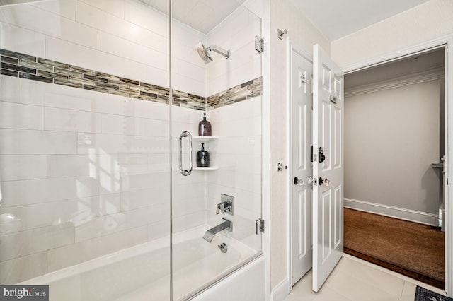 full bathroom with combined bath / shower with glass door, baseboards, and tile patterned floors