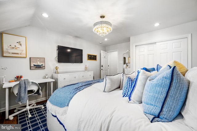 bedroom featuring visible vents, a notable chandelier, recessed lighting, and a closet