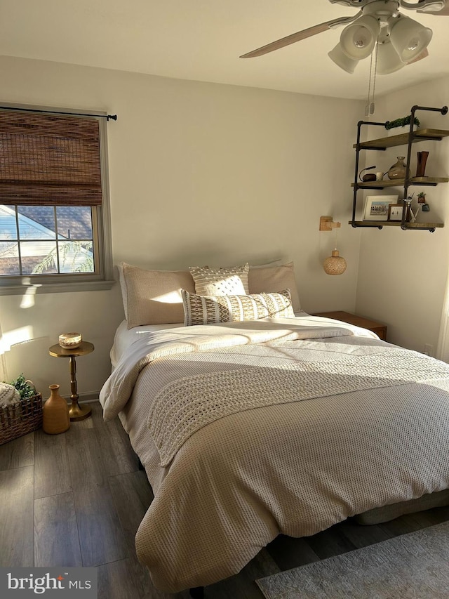 bedroom with hardwood / wood-style flooring