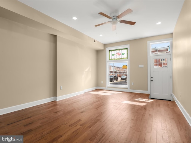 foyer entrance featuring recessed lighting, a ceiling fan, light wood-type flooring, and baseboards