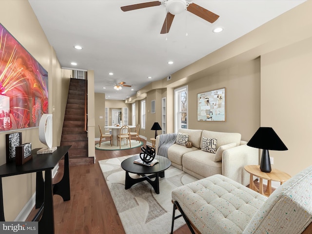 living area featuring stairs, recessed lighting, wood finished floors, and ceiling fan