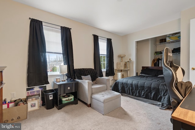 carpeted bedroom with a closet