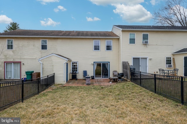 back of property featuring cooling unit, a lawn, and a fenced backyard