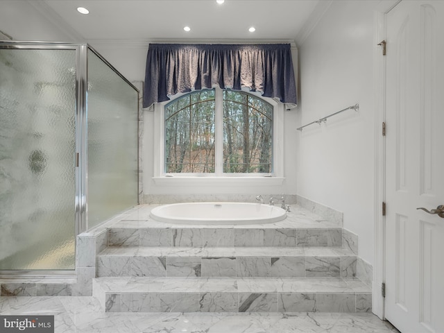 bathroom with a stall shower, a garden tub, ornamental molding, and recessed lighting