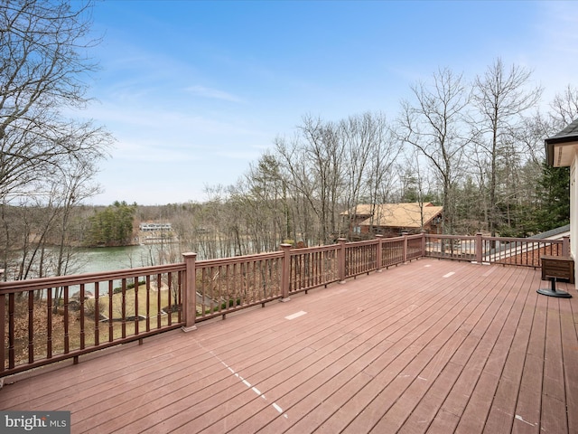 wooden terrace with a water view