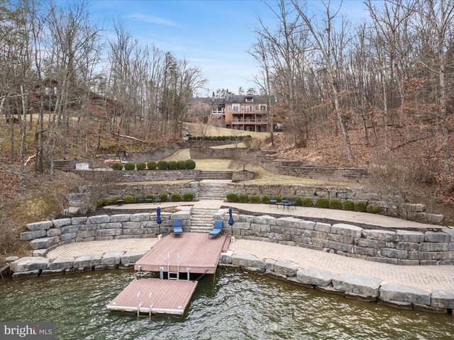 dock area featuring a water view