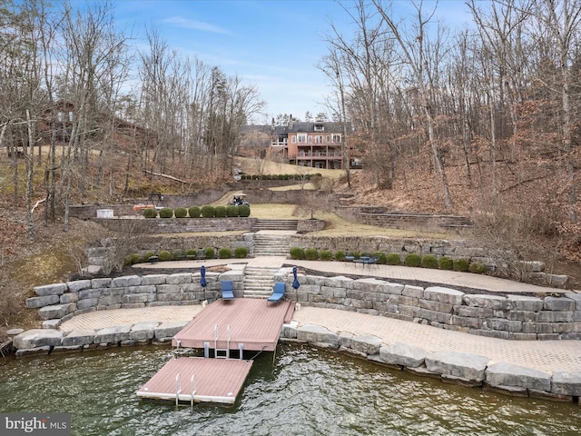 dock area with a water view