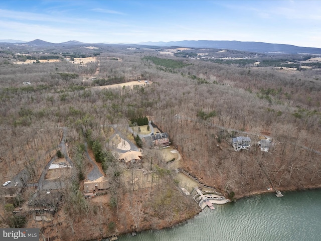 aerial view featuring a water and mountain view