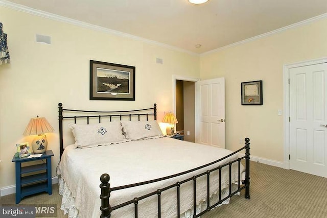 bedroom featuring crown molding, baseboards, and light carpet