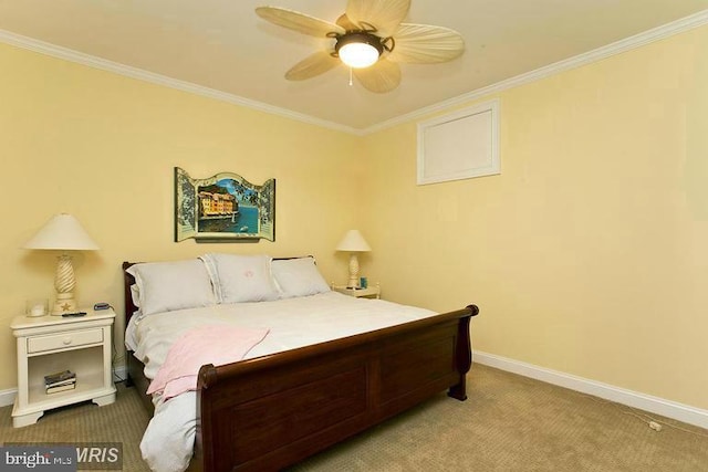 bedroom featuring crown molding, carpet flooring, baseboards, and ceiling fan