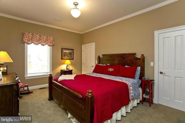 bedroom with light colored carpet, crown molding, and baseboards