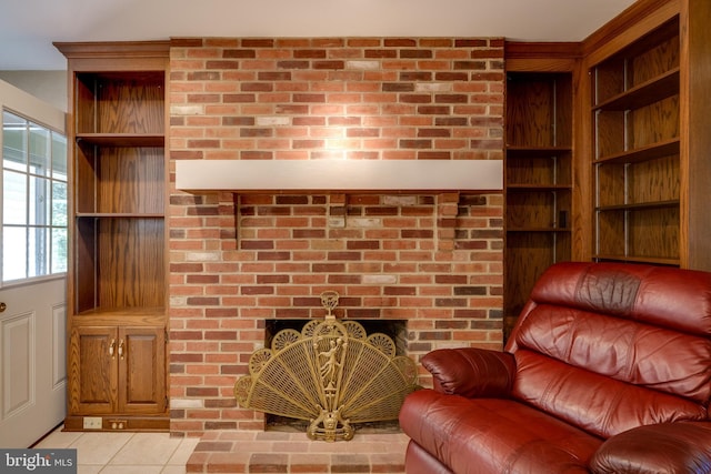 living room featuring light tile patterned floors and built in features