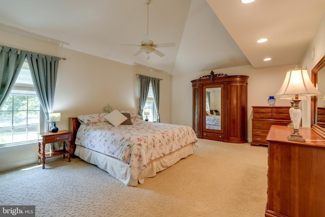 bedroom featuring recessed lighting, light carpet, ceiling fan, and vaulted ceiling