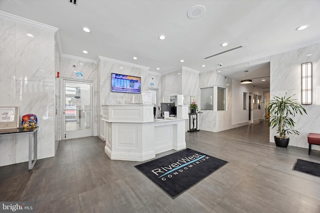 kitchen featuring recessed lighting, tile walls, and crown molding