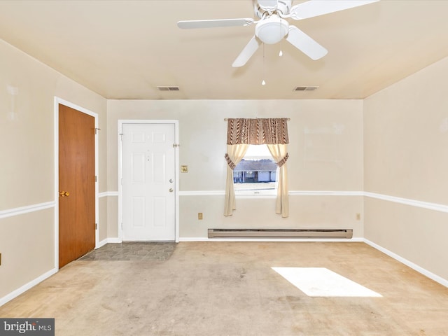 carpeted spare room with a baseboard radiator, baseboards, visible vents, and a ceiling fan