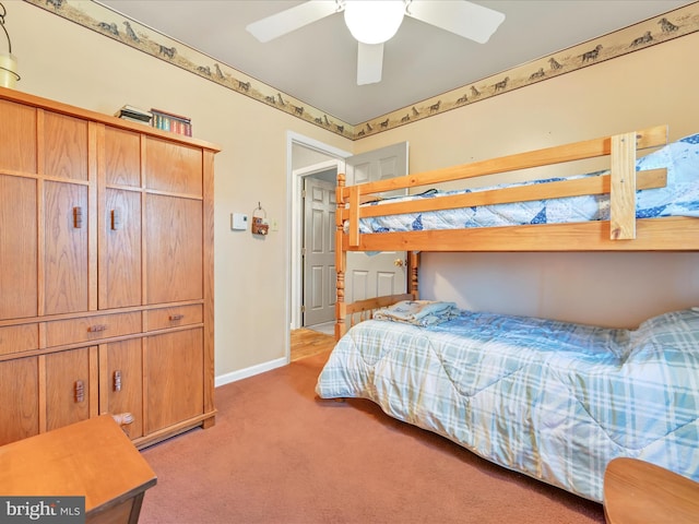 bedroom featuring a ceiling fan, baseboards, and light carpet