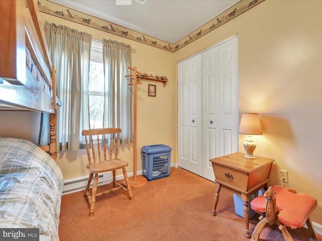 living area featuring baseboards, light carpet, and baseboard heating