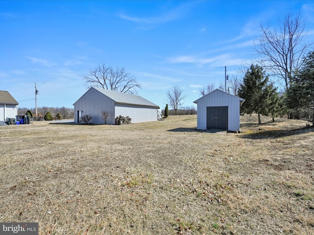 exterior space with an outbuilding and a shed