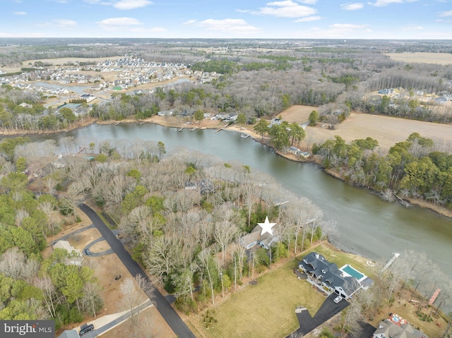 birds eye view of property featuring a water view