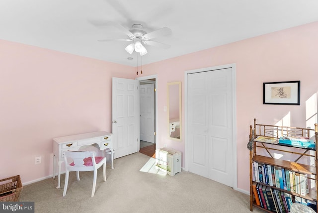 rec room featuring carpet flooring, baseboards, and a ceiling fan