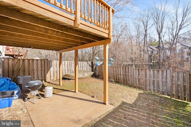 view of patio featuring central AC unit and a fenced backyard